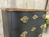 Small Black Serpentine Chest of Drawers