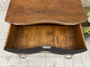 Small Black Serpentine Chest of Drawers