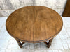 Circular Mid Century Oak extendable Dining Table