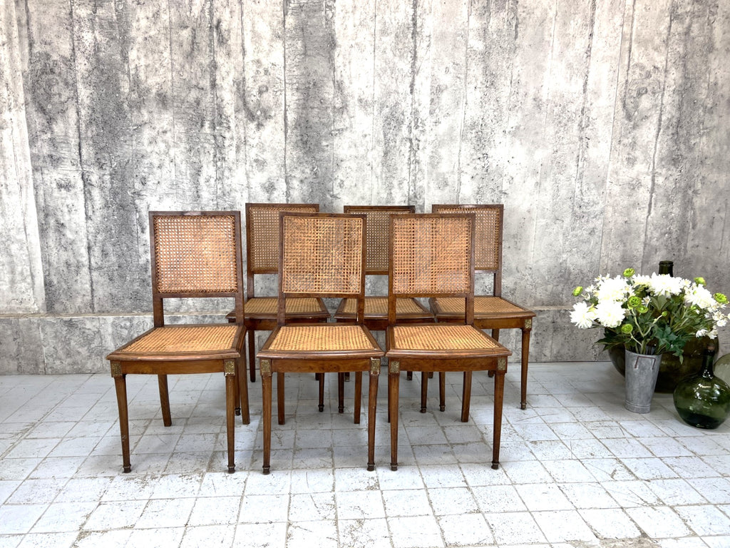 Set of 6 Cane Dining Chairs (With 2 that require the cane work to be fixed)