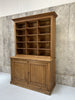 Two Piece Dresser with Cabinets and Pigeon Hole Storage