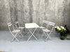 White Metal Folding Garden Table and Set of 4 Folding Chairs