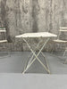 White Metal Folding Garden Table and Set of 4 Folding Chairs
