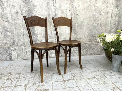 A Pair of Embossed Bentwood Bistro Chairs