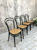 Set of Four Black Thonet Round Back Style Bentwood Bistro Chairs with Cane Seat