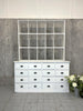 White Pharmacy Dresser with a Drawer Base and a Freestanding Pigeon Hole Top