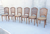 Set of 5 (6) Carved Cane Chairs